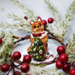 Cheetah with a Christmas tree