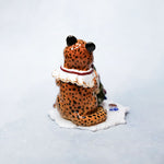 Cheetah with a Christmas tree