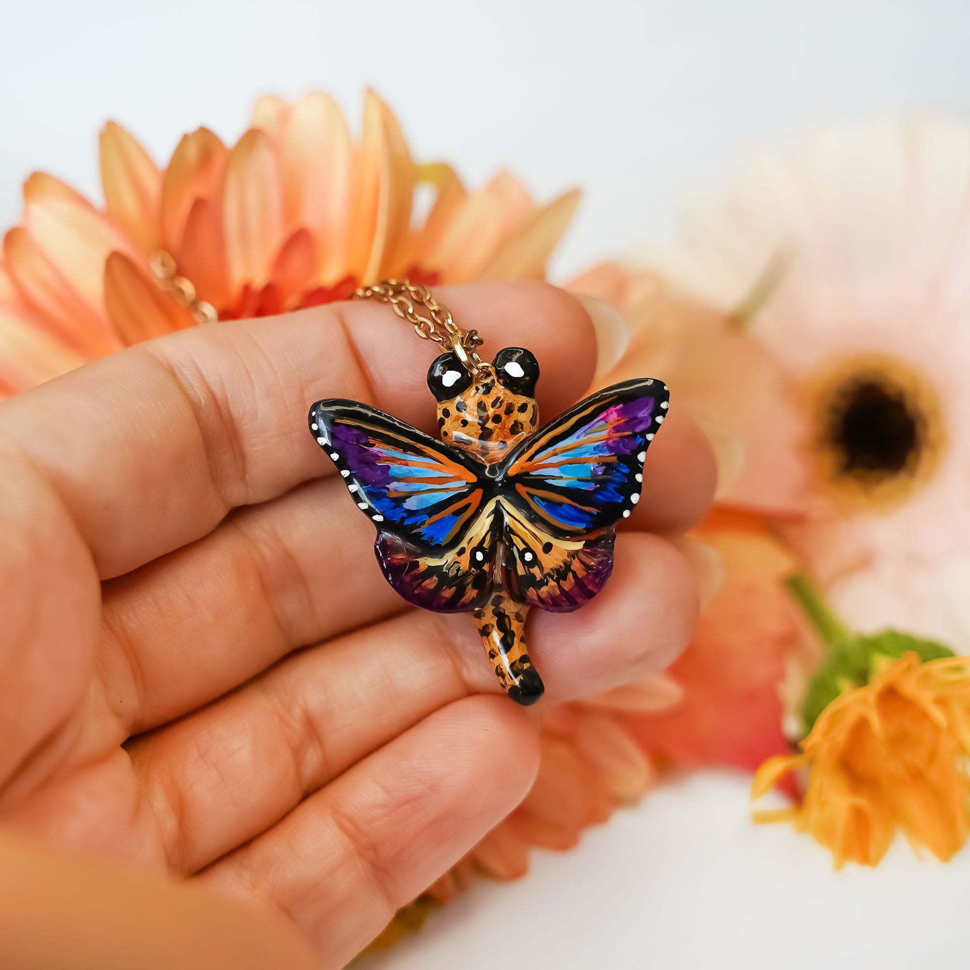 Cheetah with butterfly wings pendant