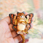 Cheetah with peach butterfly wings