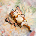 Cheetah with peach butterfly wings