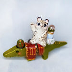 Snow Leopard with Crocodile