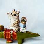 Snow Leopard with Crocodile