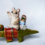 Snow Leopard with Crocodile