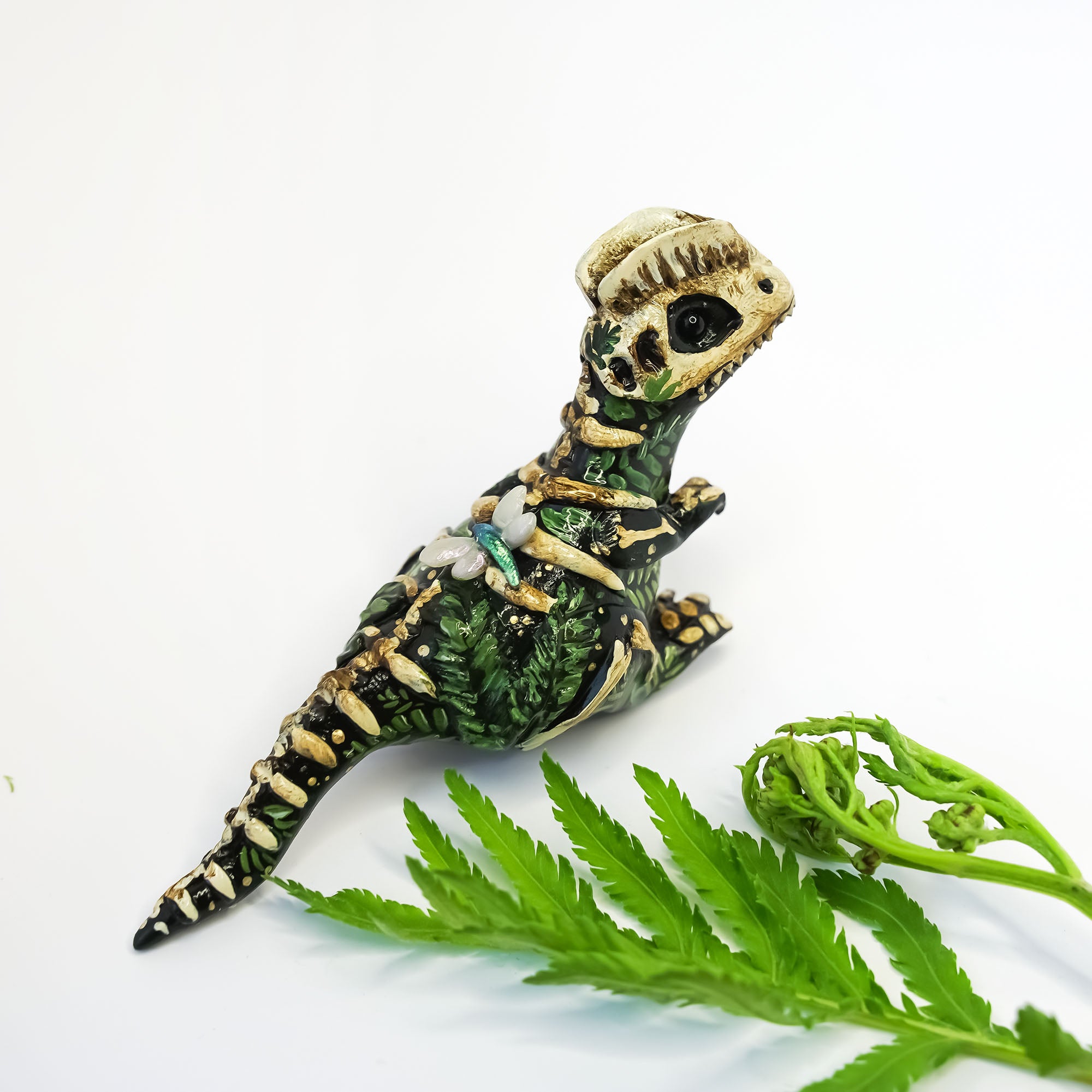 Dilophosaurus fossil figurine