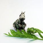 Dilophosaurus fossil figurine