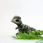 Dilophosaurus fossil figurine
