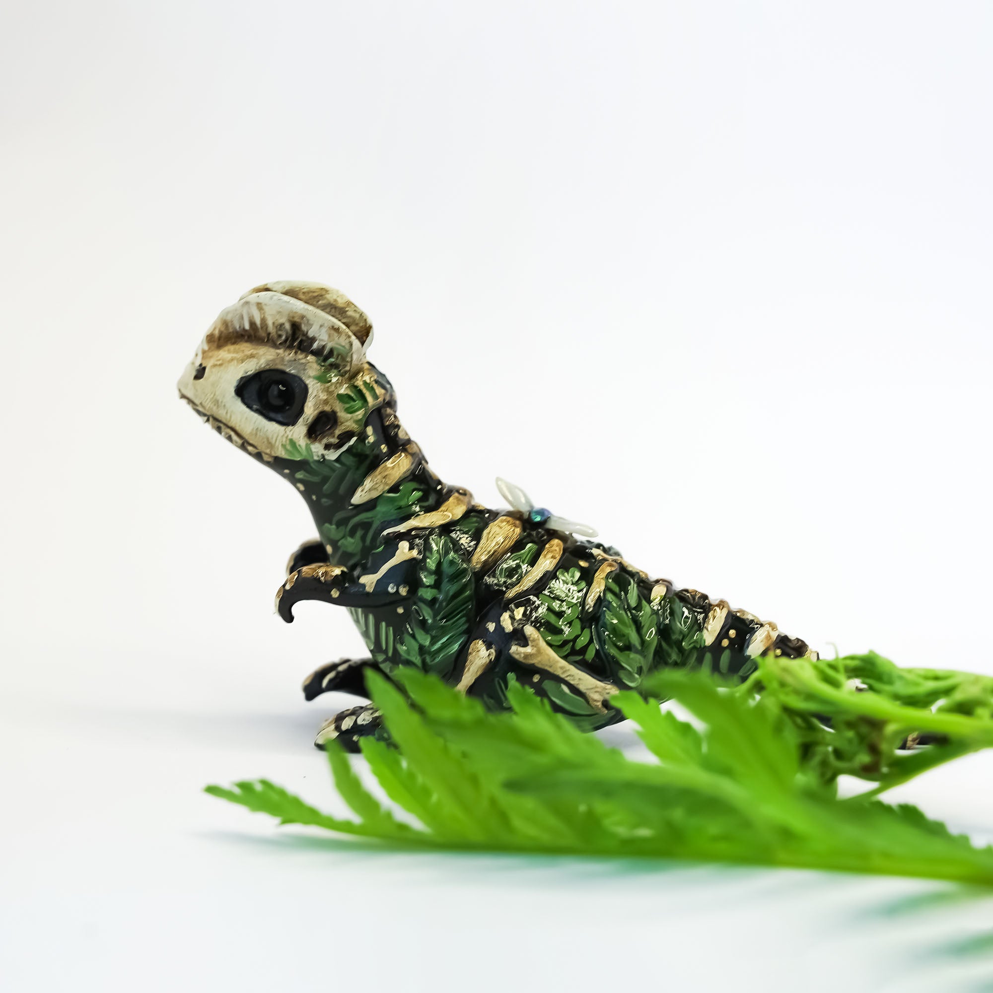 Dilophosaurus fossil figurine