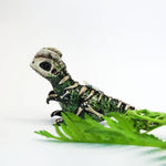 Dilophosaurus fossil figurine