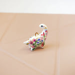 Dinosaur with flowers pendant