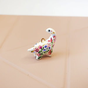 Dinosaur with flowers pendant