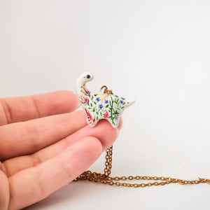 Dinosaur with flowers pendant