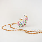 Dinosaur with flowers pendant