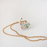 Dinosaur with flowers pendant