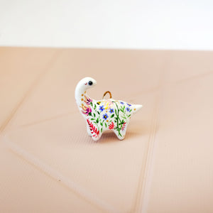 Dinosaur with flowers pendant