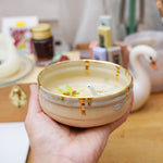 Small ceramic aquarium with a porcelain dinosaur