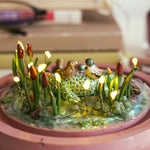 Sleeping dragon with curious ducks - diorama