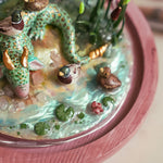 Sleeping dragon with curious ducks - diorama