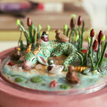 Sleeping dragon with curious ducks - diorama
