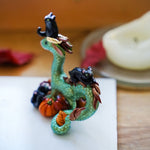 Dragon with black cats figurine