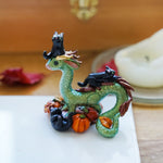 Dragon with black cats figurine
