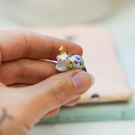 Ermine with a gold star pendant