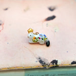 Ermine with a gold star pendant