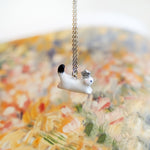 Ermine with a silver star pendant