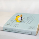 Butterfly fish with a star pendant