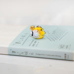 Butterfly fish with a star pendant