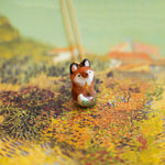 Fox with a star and a fern pendant