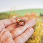 Fox with a star and a fern pendant