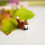 Fox with a star pendant