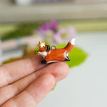 Fox with a star pendant