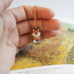 Fox with a star and a fern pendant