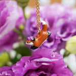 Jumping fox with flowers pendant