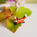Fox with a star pendant