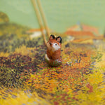 Fox with a star and a fern pendant