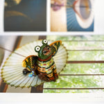 Tabby cat with butterfly wings - Autumn Treasure Collector