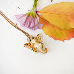 Ginger cat with butterfly wings pendant