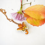 Ginger cat with butterfly wings pendant