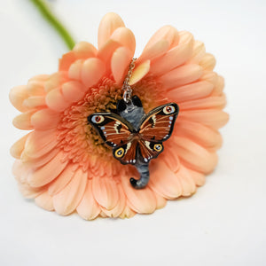 Grey and white cat with butterfly wings pendant