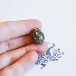 Hedgehog with a star pendant