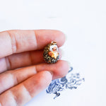 Hedgehog with a star pendant