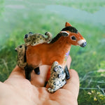 Przewalski horse with baby snow leopards figurine