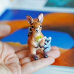 Kangaroo with cute koalas figurine