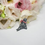 Seal with a pink bow