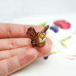 Leopard with pink butterfly wings pendant