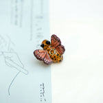 Leopard with pink butterfly wings pendant