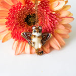 Leopard with moth wings pendant